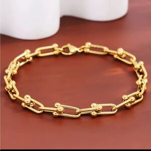 Zara u-shaped Gold charm Bracelet